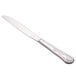 A Libbey stainless steel dinner knife with a fluted handle.