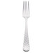 A Libbey stainless steel dinner fork with a textured silver handle.