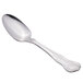 A Libbey stainless steel serving spoon with a handle.