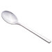 A Libbey Elexa stainless steel dessert spoon with a silver handle.