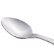 A close-up of a Libbey Kings stainless steel dessert spoon with a silver handle.