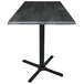 A Holland Bar Stool black steel square table top with black metal cross base.