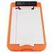 A Saunders Hi-Visibility Orange Storage Clipboard with a paper and a calculator on it.