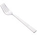 A silver Libbey Gibraltar salad fork with a white handle.