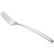 An Arcoroc stainless steel dinner fork with a white handle on a white background.