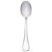 A silver Libbey demitasse spoon with a white handle.