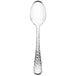 A Libbey stainless steel dessert spoon with a textured silver handle.