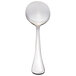 A Libbey stainless steel bouillon spoon with a white handle and silver spoon.