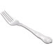 A Libbey Kings stainless steel salad fork with a design on the handle.