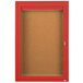 A red Aarco enclosed bulletin board cabinet with a glass door and key