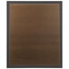 A brown rectangular bulletin board with a bronze frame and black border.