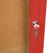 An Aarco red bulletin board cabinet door with a key in the keyhole.