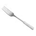 A Choice stainless steel dinner fork with a white handle.