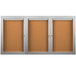 An Aarco 3 door bulletin board cabinet with cork boards inside.
