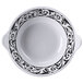 A white Soho melamine bowl with black designs.