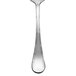 A silver stainless steel Chef & Sommelier dinner spoon with a patterned handle.