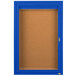 A blue Aarco indoor enclosed bulletin board cabinet with a glass door and key-lock.