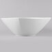A white Schonwald square porcelain bowl with a curved edge.
