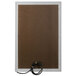 A rectangular brown bulletin board with a satin anodized finish and a black cord.