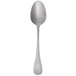 A silver Chef & Sommelier dessert spoon with a patina finish on a white background.