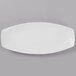 A white rectangular porcelain tray with curved edges.