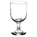 A close-up of a Libbey Embassy wine glass with a small base.