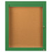 A green framed Aarco indoor bulletin board.