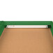 A green Aarco indoor bulletin board cabinet with 1 light on it.