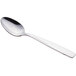 A Libbey stainless steel teaspoon with a silver handle on a white background.