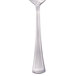 A stainless steel dessert spoon with a white background.