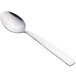 A close-up of a Libbey stainless steel dessert spoon with a silver handle.