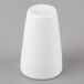 A white cone shaped Schonwald pepper shaker.
