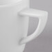 A close-up of a white Schonwald porcelain coffee mug with a handle.