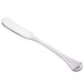 A silver World Tableware butter spreader with a white background.
