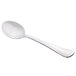 A Libbey stainless steel round bowl soup spoon with a white handle on a white background.
