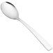 A close-up of a Libbey stainless steel dessert spoon with a long handle.