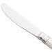 A Libbey stainless steel bread and butter knife with a white handle.