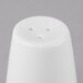 A white Schonwald porcelain salt shaker with holes.