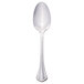 A World Tableware stainless steel dessert spoon with a round handle.