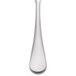 A close-up of a Reserve by Libbey stainless steel bouillon spoon with a white handle.