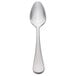 A stainless steel demitasse spoon with a silver handle.