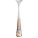 A Master's Gauge stainless steel demitasse spoon with a design on the handle.