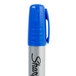 A close-up of a blue Sharpie King Size marker with silver writing.