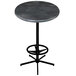 A round black steel laminate bar height table with a black steel base.