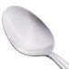 A close-up of a Libbey Vermont stainless steel tablespoon with a silver handle.