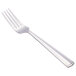 A silver Libbey Vermont dinner fork with a white handle.