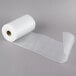 A roll of clear plastic vacuum packaging material.