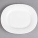 A white Villeroy & Boch porcelain oval platter with a white rim.