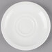 A white Villeroy & Boch porcelain saucer with a circular design.