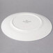 A Villeroy & Boch white porcelain plate with a white rim.